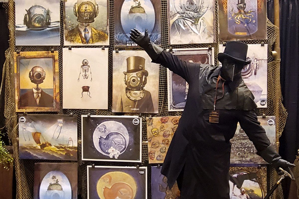 Plague Doctor hanging out in front of our booth at an Oddities show